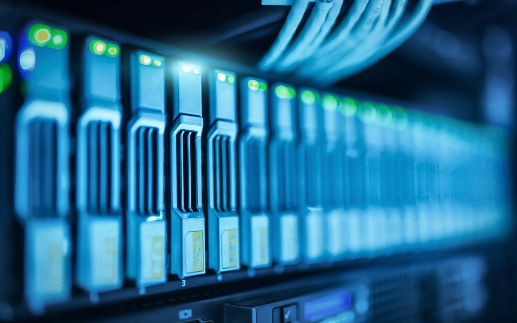 Rack storage array with rows of drive bays and activity lights
